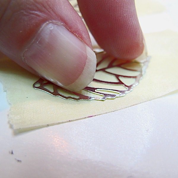 pressing leaf onto tape