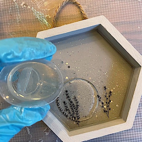 adding clear epoxy to wall hanging crafts