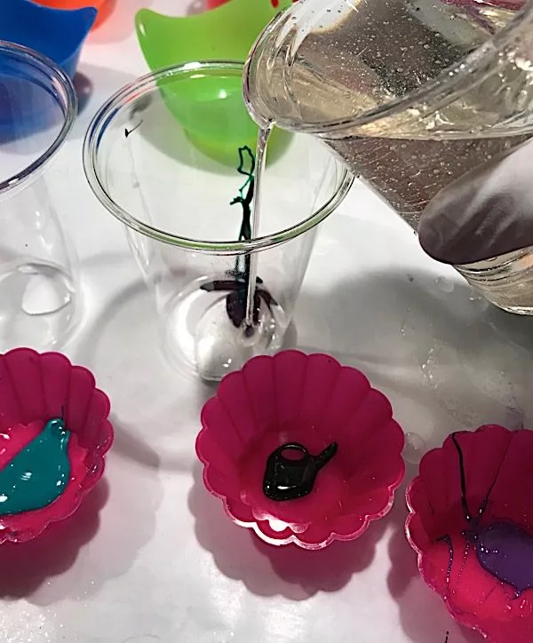 adding resin to cups