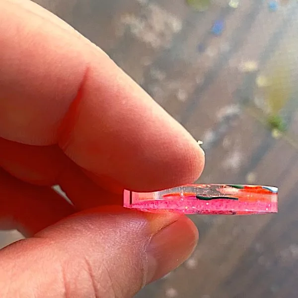 epoxy charm with resin layers