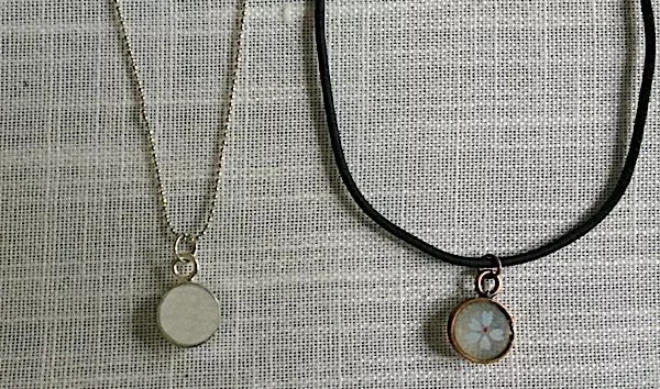 backs of open bezel resin pendants