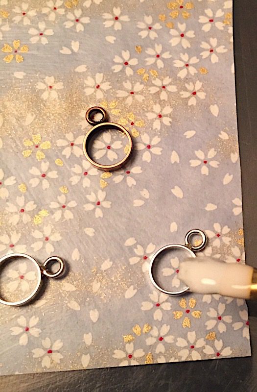 adding mod podge to paper