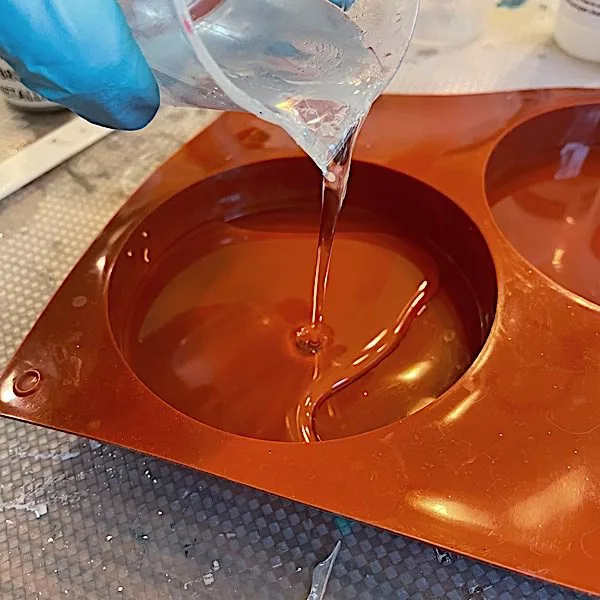 adding clear epoxy to mold